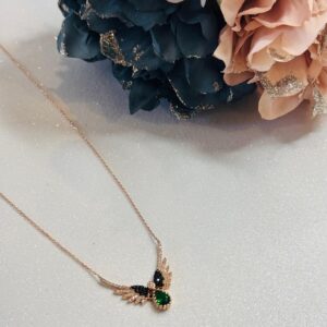 Wings with green stone necklace